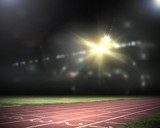 Voie d'athlétisme sous les projecteurs